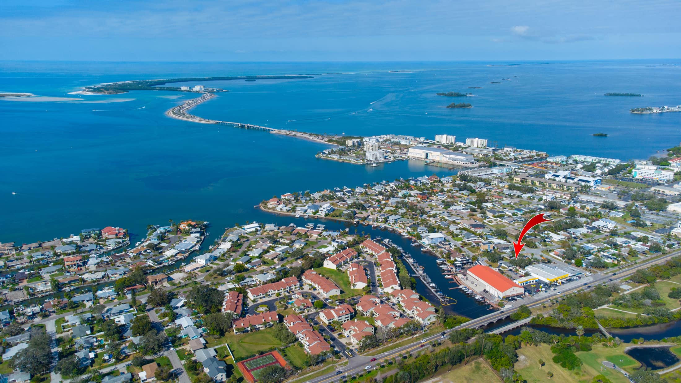 Aerial overhead view of the property and neighborhood